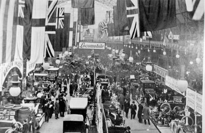 General View of Crowds Inspecting the Exhibits at a Motor Show by English Photographer